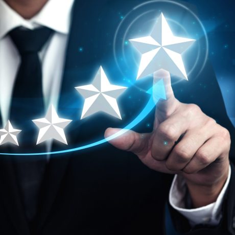 Customer review satisfaction feedback survey concept. User give rating to service experience on online application. Customer can evaluate quality of service leading to reputation ranking of business.